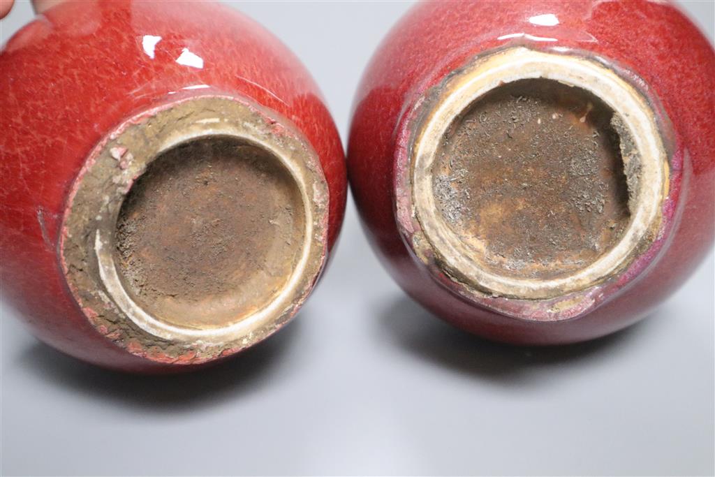 A pair of Chinese sang-de-boeuf vases, height 19cm